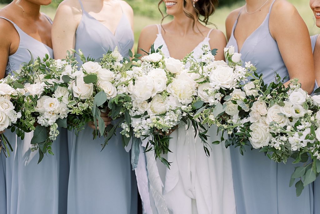 Bride and bridesmaids with bouquets Mint Springs Farm - Rachel Fugate Photography