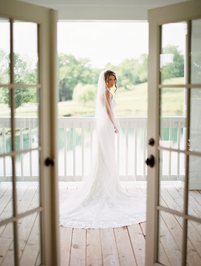Bride on Mint Springs Farm porch. Rachel Fugate Photography
