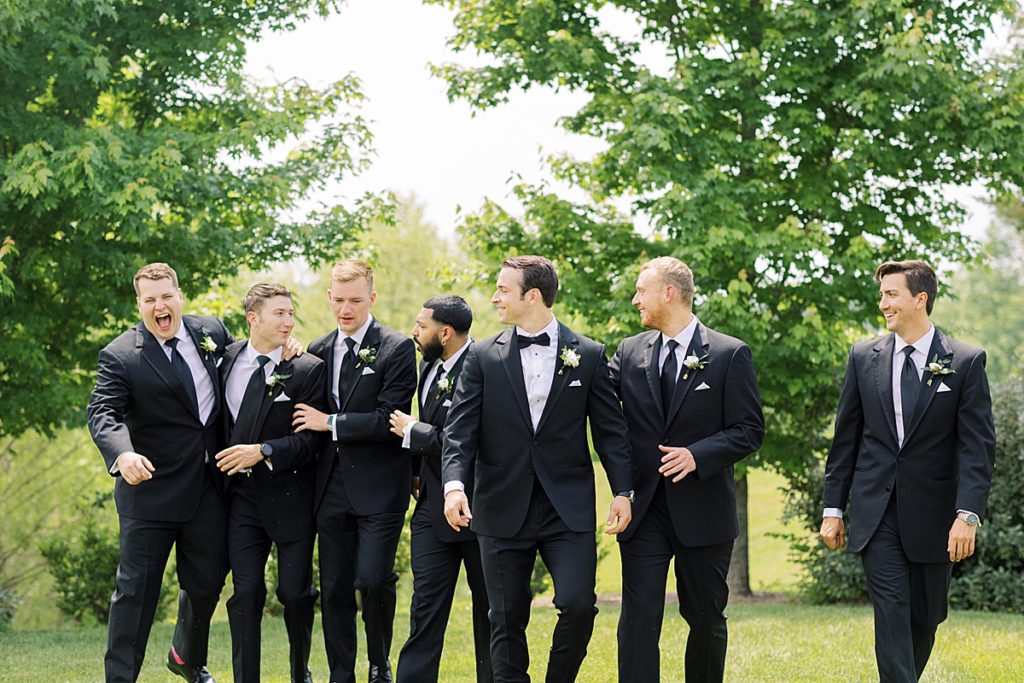 Groom and groomsmen walking to wedding Mint Springs Farm TN - Rachel Fugate Photography