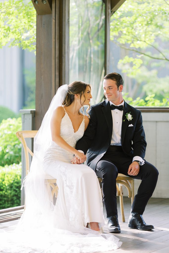 Bride and groom looking at each other during wedding - Rachel Fugate Photography