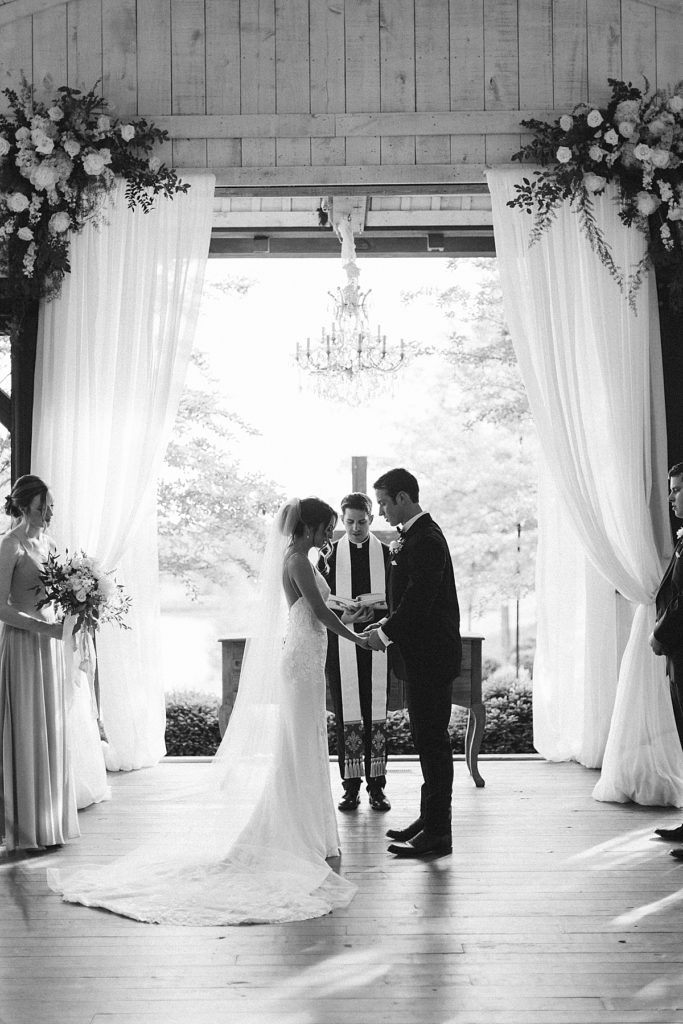 Bride and groom black and white ceremony portrait - Rachel Fugate Photography