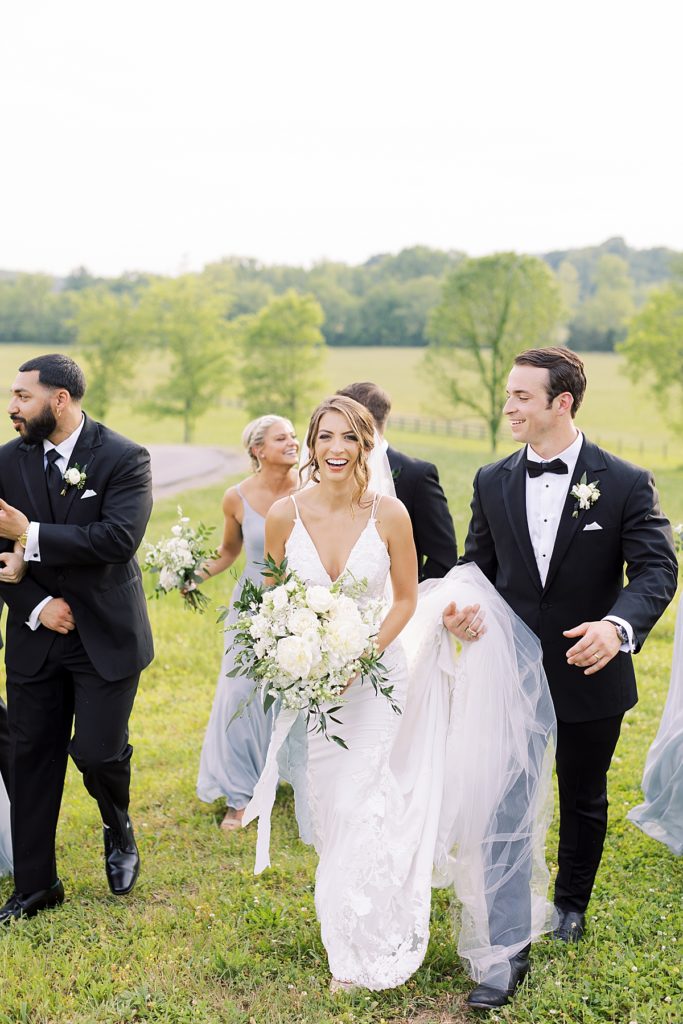 Bridal party walking after ceremony - Rachel Fugate Photography