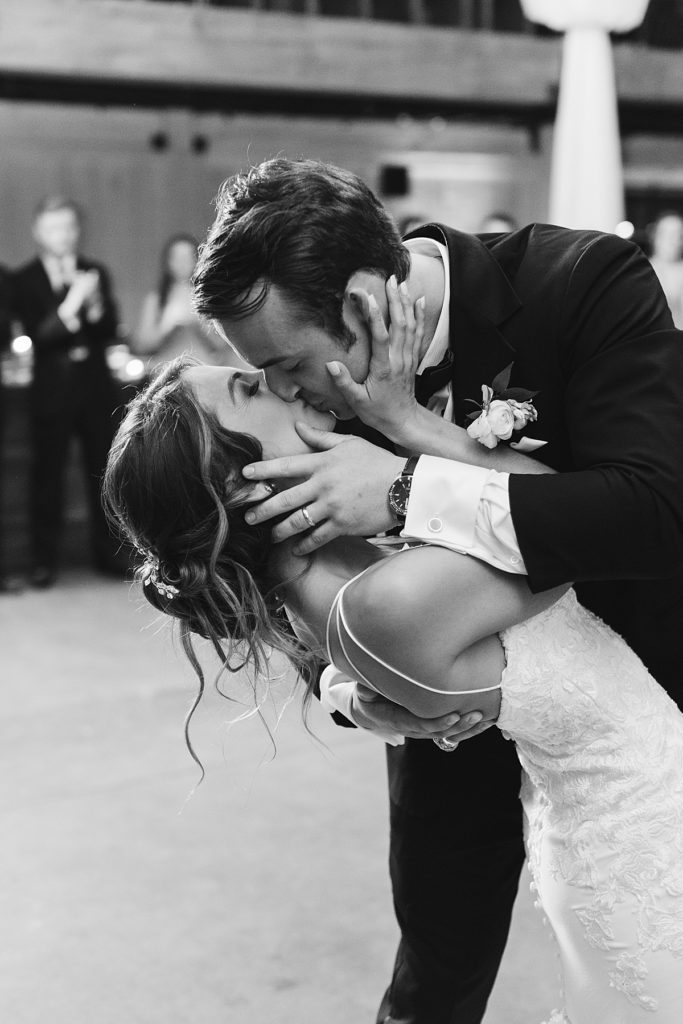 Bride and groom kiss on the dance floor - Rachel Fugate Photography